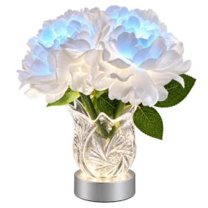 Decorative illuminated flower lamp with glowing blue and white blossoms, green leaves, and a clear glass vase.